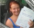 Jessica with Driving test pass certificate