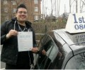Dan with Driving test pass certificate