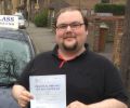 Darren with Driving test pass certificate