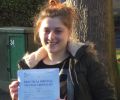 Lucy with Driving test pass certificate