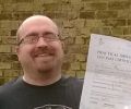 Nick with Driving test pass certificate