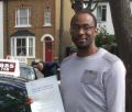 Robert with Driving test pass certificate