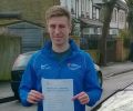 Ryan with Driving test pass certificate