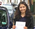 Sara with Driving test pass certificate