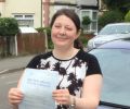 Sarah with Driving test pass certificate