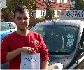 Jake with Driving test pass certificate