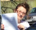 Abbi with Driving test pass certificate
