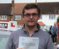 Andrew with Driving test pass certificate
