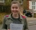 Hannah with Driving test pass certificate