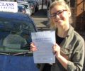 Izzy with Driving test pass certificate