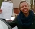 Vicky with Driving test pass certificate