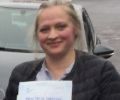 Yulia with Driving test pass certificate